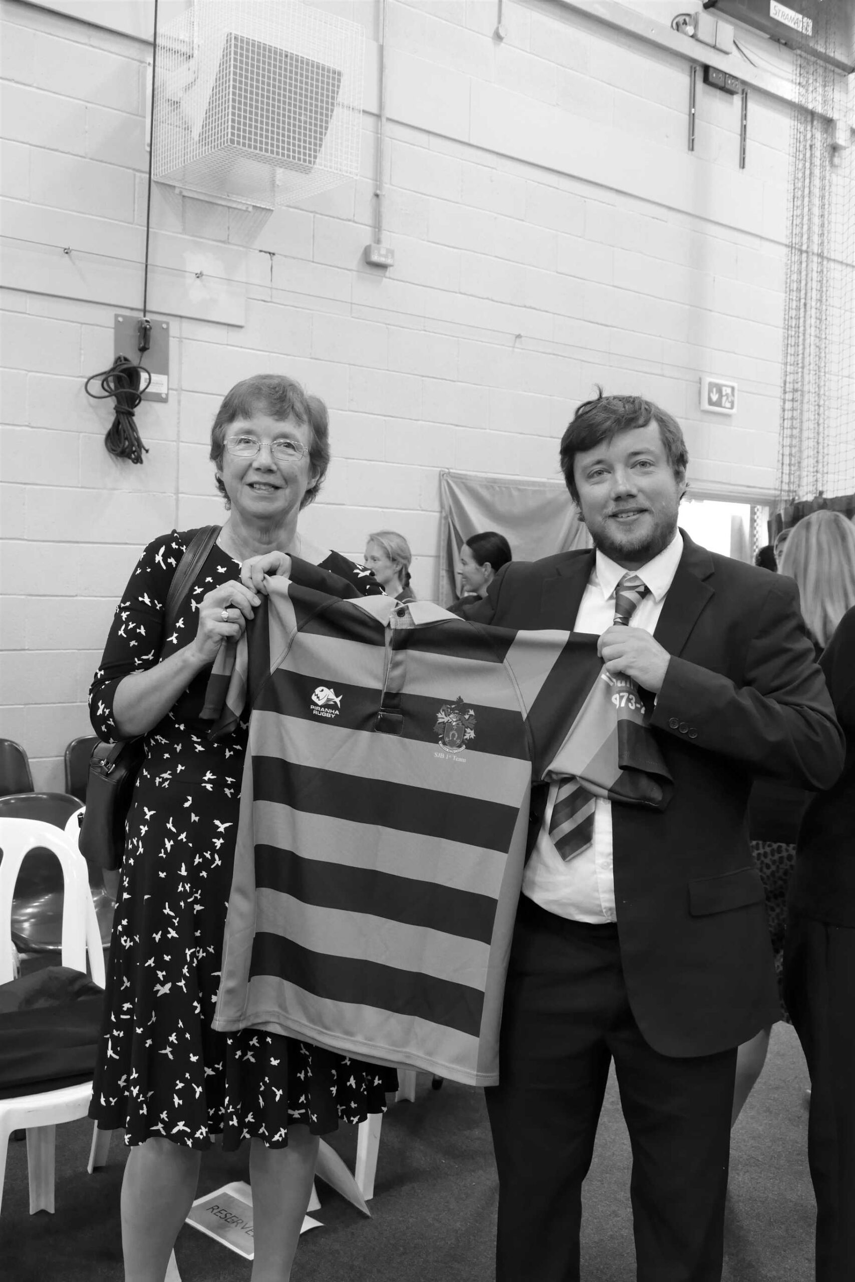 Colin Ballantyne's widow Angela and son Duncan were being presented with a special First Team Rugby Jersey in memory of Colin